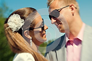 Caucasian couple with dark shades