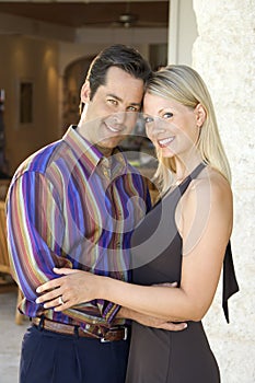 Caucasian couple embracing.