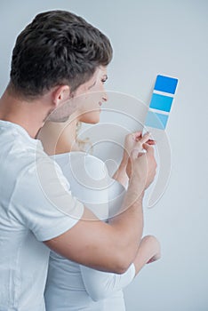 Caucasian Couple Looking at Color Indicator Paper