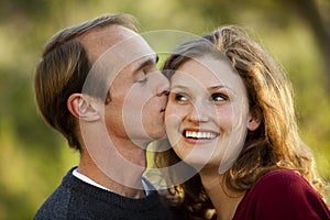 Caucasian couple in love man kissing woman