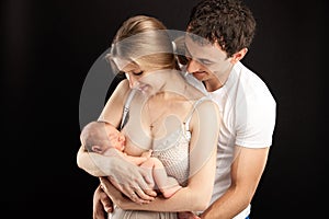 Caucasian couple with one week old boy