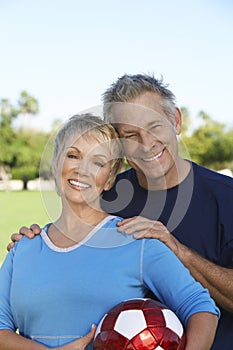 Caucasian Couple With Soccer Ball