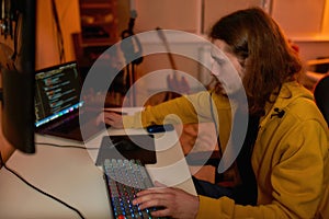Caucasian IT developer programming script or code