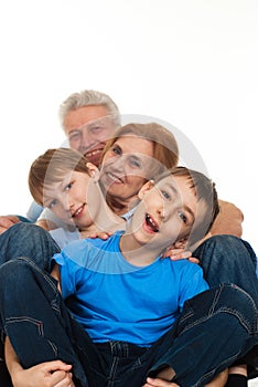 Caucasian elderly couple with their grandchildren