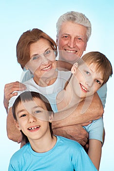 Caucasian elderly couple with their grandchildren