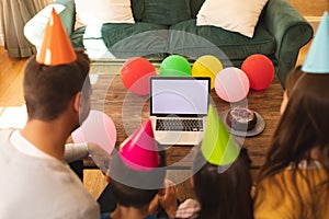 Caucasian family spending time at home together celebrating birthday