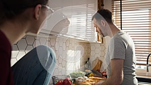 Caucasian father and daughter spending time together on cooking.