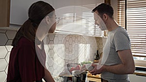 Caucasian father and daughter spending time together on cooking.