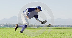 Caucasian female baseball player, fielder catching and dropping ball on baseball field