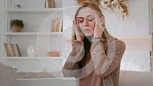 Caucasian female with laptop take off glasses suffer with astigmatism ache eyes pain tired sick ill exhausted woman