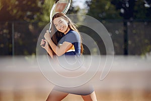 Caucasian female tennis player playing on the court outdoors