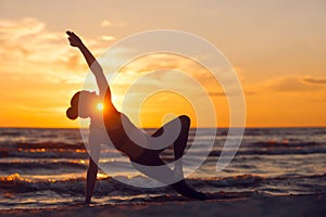 Caucasian fitness woman practicing yoga