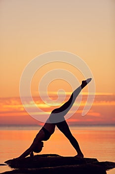 Caucasian fitness woman practicing yoga