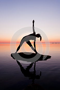 Caucasian fitness woman practicing yoga