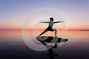 Caucasian fitness woman practicing yoga