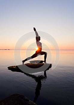 Caucasian fitness woman practicing yoga