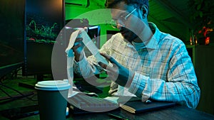 Caucasian focused man programmer checking coding guy coder male professional digital engineer IT support drinking coffee