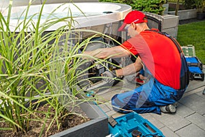 Garden SPA Worker Servicing a Hot Tub photo