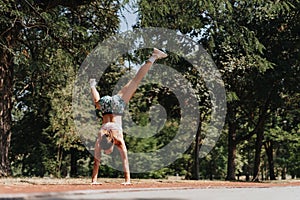 Caucasian Girl Enjoying Outdoor Fitness Practice Among Natural Environment