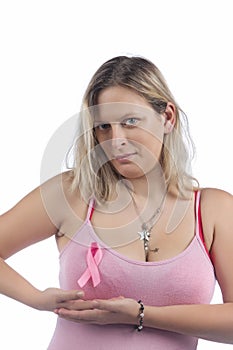 Caucasian girl holding breast cancer ribbon