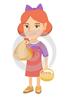 Caucasian girl holding a chicken and hen eggs.