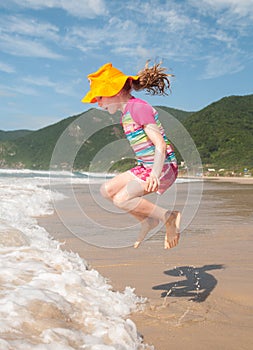 Caucasian girl jumpimg