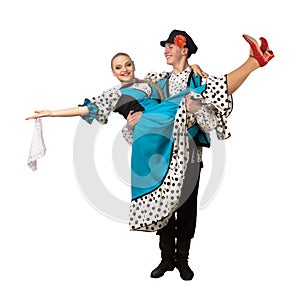 Caucasian guy keeps the girl in his arms in Russian folk costumes isolated on white