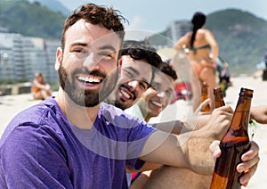 Caucasian guy at party at beach