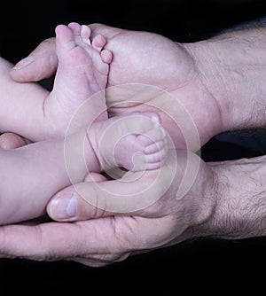 Caucasian infant tiny feet