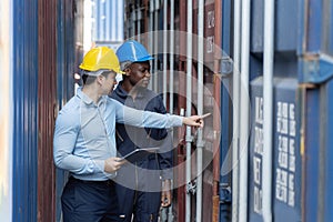 Caucasian Inspectors  Inspecting the Containers at the Port