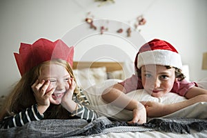 Caucasian kids enjoying Christmas holiday