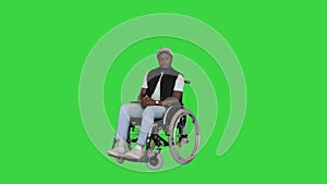 Caucasian lady pushes her disabled friend and leaves him waiting on a Green Screen, Chroma Key.