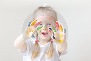 Caucasian Little Girl Painting with Colorful Hands Paints at Home Early Education