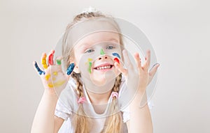 Caucasian Little Girl Painting with Colorful Hands Paints at Home Early Education