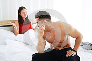 Caucasian lover Couple on the bed unhappy in having sex and have problems in relationship of married life. Erectile Dysfunction