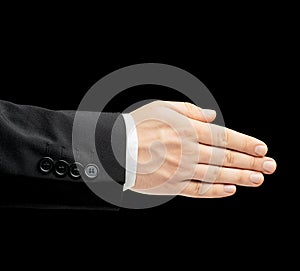 Caucasian male hand in a business suit isolated