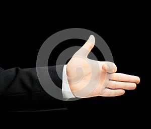 Caucasian male hand in a business suit isolated