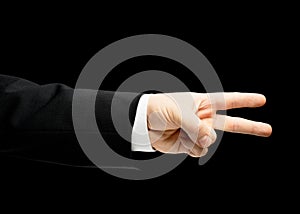 Caucasian male hand in a business suit isolated