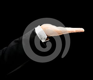 Caucasian male hand in a business suit isolated