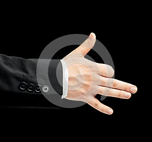 Caucasian male hand in a business suit isolated