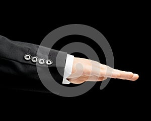 Caucasian male hand in a business suit isolated