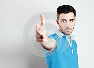 Caucasian male making photo frame with his hands