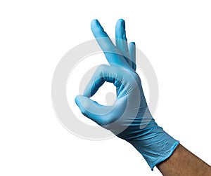 Caucasian male right hand in blue latex glove isolated over white background.