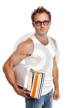 Caucasian man carrying stack of books