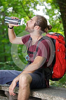Caucasian man drinking water
