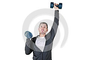 Caucasian man exercising with dumbbells on studio