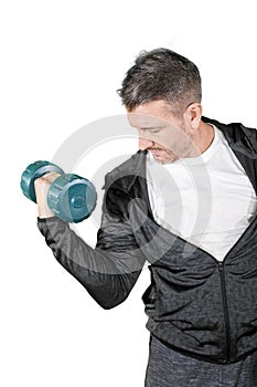 Caucasian man lifting a dumbbell on studio