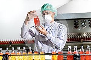 Caucasian man, Nutritionists are checking the quality of herbal drinks