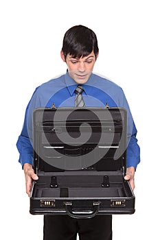 Caucasian man presenting an open empty briefcase