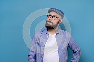 Caucasian man thinking looking up pensive studio portrait on isolated white background
